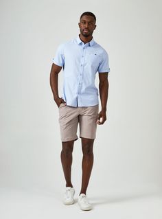 Smiling is easy in this stretch premium cotton short sleeve shirts. The geometric pattern stands out without being busy; while the 7DIAMONDS signature details elevate the style. Details Model is 6'1" and wears a size medium. Care: Machine wash cold on delicate cycle, low tumble dry, do not iron Composition: 50% Cotton/ 46% Polyester/ 4% Spandex Summer Business Casual Cotton Short Sleeve Shirt, Light Blue Short Sleeve Shirt For Business Casual, Light Blue Short Sleeve Shirt For Work, Light Blue Tops For Business Casual Summer, Light Blue Summer Tops For Business Casual, Button Up With Shorts, Denim Accessories, Wedding Outfits, Short Sleeve Button Up