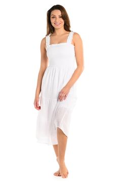 Feel breezy in this ruffled cover-up sundress featuring a smocked bodice and handy pockets. 46" length (size medium) Square neck Elasticized straps 80% rayon, 15% nylon, 5% polyester Hand wash, line dry Imported lined Summer Dresses With Smocked Bodice For Daywear, Breezy Vacation Dress With Ruffled Straps, Summer Midi Dress With Smocked Back For Daywear, Spring Sundress With Smocked Bodice For Daywear, Summer Dress With Smocked Back For Daytime, White Flowy Midi Dress With Ruffled Straps, Midi Length Sundress With Ruffle Hem For Daywear, Casual Midi Dress With Ruffled Straps, Vacation Ruched Midi Dress With Ruffled Straps