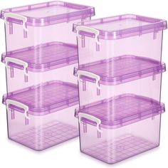 three plastic storage containers with lids and handles