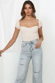 Length from shoulder to hem of size S/M: 54cm. Beige knit top. Non-lined. Cold hand wash only.  Model is a standard XS and is wearing size XS.  True to size.  Lightweight, stretchy knit fabric. No zipper. Slip-on style.  Rayon/Spandex. Oh dear. Back to back day? No sweat babe! Chic and all-day sophistication is easy with this lush new edit! Show off all your assets with the knit top's fitted silhouette and romantic Queen Anne neckline. We're teaming ours with our fave denim jeans and mid-low mules. Queen Anne Neckline, Back Day, Knit Blazer, Neutral Outfit, Long Sleeve Lace Dress, Fitted Silhouette, Classy Women, Style Chic, New Tops