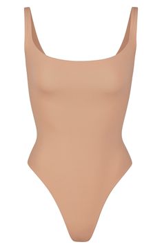 Sculpt your body's natural shape with a sleeveless bodysuit from Kim Kardashian West's SKIMS that holds you in and lifts you up in all the right places. Reflecting the brand's passion for highly technical shapewear solutions for every body, this everyday piece has a whisper-soft, seamless construction, high-cut legs and thong back that remains invisible under clothing. Style Name:Skims Fits Everybody Square Neck Sleeveless Bodysuit (Regular & Plus Size). Style Number: 6125045. Yellow Fits, Square Neck Bodysuit, Sleeveless Bodysuit, Summer Breeze, Material Girls, High Cut, Boss Lady, Kim Kardashian, Shapewear