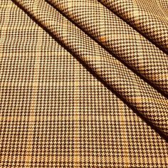 a brown and black checkered fabric