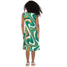 Our vibrant Green Print Sleeveless Pockets Dress, a chic and playful addition to your little ones wardrobe. Crafted with care, this dress features a bold green and orange print that adds a pop of color and fun to any ensemble. Designed with a sleeveless, loose relaxed fit, it ensures comfort and freedom of movement for all day wear, making it perfect for summer adventures and springtime outings. Complete with convenient side pockets, it effortlessly combines style and functionality, providing sp Playful Multicolor Sleeveless Summer Dress, Colorful Playful Sleeveless Dress, Colorful Sleeveless Playful Dress, Green Casual Knee-length Sleeveless Dress, Casual Green Knee-length Sleeveless Dress, Casual Green Sleeveless Knee-length Dress, Trendy Sleeveless Dress With Vibrant Print, Playful Green Dress For Beach, Playful Green Dresses For Beach