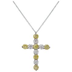 A classic pendant necklace, showcasing six fancy yellow diamonds spaced by white round brilliant cut diamonds, set in an elegant shared prong design. Diamonds weigh 4.32 carats total. Finely made with 18K white gold and platinum.  Roman Malakov is a custom house, specializing in creating anything you can imagine. If you would like to receive a special quote on a custom piece, please message or call us. Luxury Yellow Necklace With Diamond Accents, Luxury Yellow Necklaces With Diamond Accents, Yellow Round Necklaces With Diamond Accents, Yellow Diamond Fine Jewelry Necklace, Yellow Diamond Necklace In Fine Jewelry Style, Luxury Yellow Diamond Necklace With Accents, Luxury Yellow Necklace With Brilliant Cut, Fine Jewelry Yellow Diamond Necklace, Yellow Diamond Necklace For Anniversary