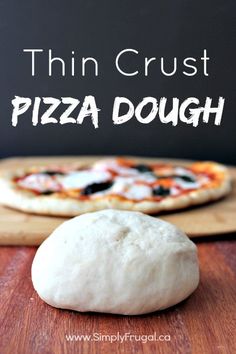 thin crust pizza dough on a cutting board