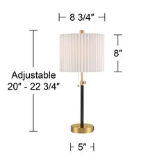 an image of a lamp with measurements for the base and lampshade on it