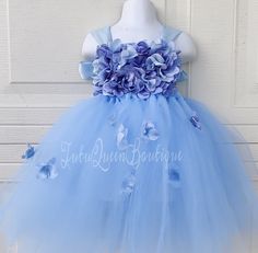 Our Beautiful full tutu dress is made out of high end soft tulle material . Sizes are according to 🇺🇸USA STANDARD SIZING. Tutu is tied comfortably in the back for a perfect fit ! Color Combo Choices : Are listed in Details but you can also custom color choice ! Message me your custom color 📭ALL tutus and dresses are shipped in a box with tracking. Arrives 2-5 days through USPS after scheduled delivery date. 📝Please read listing details. Thank you for visiting my page! For more photos and my Whimsical Summer Tutu Dress With Tulle Skirt, Whimsical Tulle Princess Dress For Spring, Light Blue Tutu Dress For Summer Dress-up, Whimsical Spring Tulle Princess Dress, Fitted Light Blue Princess Dress For Spring, Light Blue Tulle Princess Dress With Ruffles, Blue Sleeveless Fairy Dress For Spring, Blue Sleeveless Spring Fairy Dress, Whimsical Tulle Tutu Dress For Spring