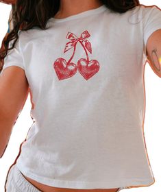 Y2k Heart Print Top For Spring, Fitted Cotton T-shirt With Cherry Print, Sweet Fitted Cotton T-shirt, Y2k Style Cotton Tops With Cherry Print, Sweet Red Crew Neck Top, White Y2k Tops With Cherry Print, Y2k Crew Neck T-shirt With Cherry Print, Cute White Top With Heart Graphic, Cute Cotton T-shirt With Heart Graphic