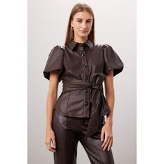 Brown faux leather (100% Polyurethane). Top. Short sleeves. Collar. Front button closure. 24" from shoulder to hemline. Imported. Faux Leather Shirt, Faux Leather Top, Rent The Runway, Leather Shirt, Closet Designs, Leather Top, Pleated Skirt, Puff Sleeve, Faux Leather