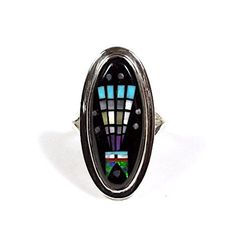 (Guaranteed 100% Sterling Silver) High quality 925 sterling silver ring with natural genuine multicolor stones. The ring is handcrafted and the stones are inlaid together to create this beautiful Southwestern piece of art jewelry. The stones consist of natural  Black Onyx, Coral, Mother of Pearl, and Fire Opals. The top of the ring measures 1-1/4'' x 5/8''. Our silver is genuine 925 sterling silver. You will receive the item in a gift box. Thanks for looking and check out more items in my Etsy s Multicolor Oval Hallmarked Ring, Oval Multicolor Hallmarked Ring, Black Sterling Silver Jewelry With Inlay, Black Ring With Inlay, Black Rings With Inlay, Unique Multicolor Rings With Polished Finish, Black Inlay Round Ring, Multicolor Sterling Silver Hallmarked Rings, Multicolor Hallmarked Sterling Silver Rings