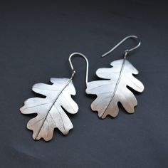 Surgical steel earrings. The individual parts are laser cut according to their own design, shaped and then joined into a finished form Silver Leaf-shaped Handmade Earrings, Nickel-free Leaf-shaped Sterling Silver Earrings, Hypoallergenic Sterling Silver Leaf-shaped Earrings, Handmade Leaf-shaped Earrings, Nickel-free Sterling Silver Leaf-shaped Earrings, Nickel Free Leaf-shaped Sterling Silver Earrings, Handmade Metal Leaf-shaped Earrings, Silver Leaf-shaped Metal Earrings, Minimalist Nickel-free Leaf-shaped Earrings