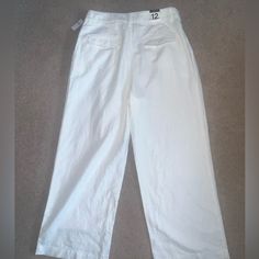 Gap Woman’s Pleated Linen White Pant. Nwt. Size 12. 55% Linen 45% Cotton. Don’t Forget To Bundle. Any Reasonable Offer Will Be Accepted . Gap Wide Leg Pants For Spring, Classic Gap Pants For Spring, Gap Cotton Wide Leg Bottoms, Classic Tapered Leg Pants By Gap, Classic Gap Tapered Leg Pants, Classic Tapered Leg Gap Pants, Gap Casual High-waisted Pants, Casual High-waisted Gap Pants, Gap Bottoms For Spring Workwear