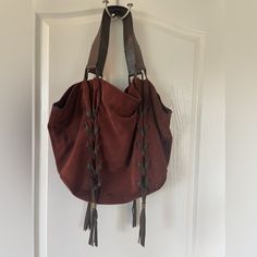 Used 1-2 Times Heavy Suede And Leather Hobo Bag Excellent Condition!! Brown Leather And A Kinda Burnt Orangie Maroon Leather Pouch Bag With Braided Handles, Leather Bucket Bag With Leather Trim, Leather Bucket Shoulder Bag With Leather Trim, Leather Bucket Bag With Shoulder Strap, Luxury Suede Hobo Tote Bag, Luxury Suede Hobo Bag For Shopping, Elegant Suede Bags With Leather Trim, Luxury Hobo Bag With Braided Handles For Everyday Use, Brown Suede Shoulder Bag With Leather Trim