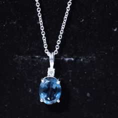 Product Details Highlight your neckline with this elegant Solitaire Pendant Necklace adorned with 8X10 MM Oval Cut London Blue Topaz in Prong Setting with Moissanite. Product Information SKU SHP-PENDANT042310003 Weight 2.00 gm (Approximate) LONDON BLUE TOPAZ INFORMATION No.of Stones 1 Pieces Total Weight 2.50 Carat (Approximate) Dimension(approx) Oval-8X10 mm-1 Pcs Color Blue Cut Brilliant Shape Oval Setting Type Prong-Setting Quality Grade AAA MOISSANITE INFORMATION No.of Stones 1 Pieces Total Weight 0.09 Carat (Approximate) Dimension(approx) Round-2.50X2.50 mm-1 Pcs Color White Cut Brilliant Shape Round Setting Type Prong-Setting Quality Grade D-VS1 View More Product Parent Collection Handle ready-to-ship-jewelry Oval Setting, Blue Topaz Pendant, Solitaire Pendant Necklace, Signature Jewelry, Round Moissanite, Solitaire Pendant, Timeless Jewelry, London Blue Topaz, London Blue