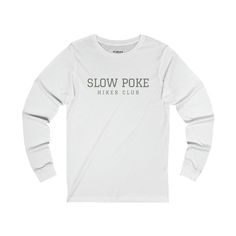 This classic unisex long sleeve tee fits like a well-loved favorite. Casually elegant with an excellent quality print, it is an irreplaceable everyday item for anyone.  100% airlume combed and ringspun cotton (fiber content may vary for different colors) Light fabric  Retail Fit Runs true to size White Long Sleeve T-shirt With Lettering, Long Sleeve T-shirt With Lettering, White Long Sleeve Tops With Lettering, One Happy Camper, Outdoorsy Gifts, Women Hiking, Hiking Tshirt, Her And Him, Hiking Gifts