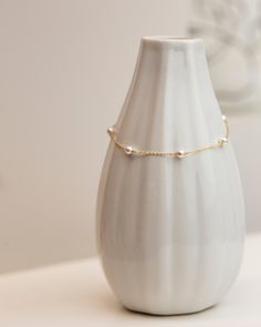 Perfect for everyday and layering!Simple and delicate bracelet - Perfect for Stacking & Layering or even alone.Featuring Swarovski pearl stations with dainty Gold Fill or Sterling Silver chain. Perfect bridesmaids gift or for bridal jewelry. • Pearl measures approx. 4mm• 1" Adjustable chain• Sterling silver or Gold filled• Swarovski pearls• Perfect gift for Bridesmaids and Bride Dainty Pearl Drop Bracelet, Dainty Pearl Drop Jewelry, Elegant Pearl Drop Chain Bracelet, Pearl Bracelets For Bridesmaids, Delicate Beaded Bracelets With Adjustable Chain, Delicate Sterling Silver Bracelet With Adjustable Chain, Elegant Beaded Bracelets With Adjustable Chain, Pearl Charm Bracelets For Bridesmaid Gift, Pearl Charm Bracelets For Bridesmaids