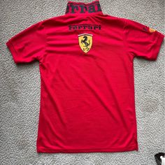 Ferrari Polo Shirt Red Collared Sports Top, Sporty Red Collared Polo Shirt, Sporty Red Polo Collar Top, Red Sporty Polo Collar Top, Sporty Red Top With Polo Collar, Red Collared Polo Shirt For Sports, Sporty Red Short Sleeve Polo Shirt, Red Collared Sporty Shirt, Red Polo Shirt For Sports