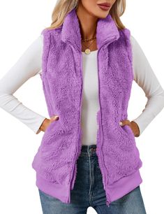 PRICES MAY VARY. ❤Plush and cozy like your favorite blanket but styled for everyday wear, the women's full zipper pockets sherpa fleece vest is a go-to layer for cool-to-cold days at the park or a tailgate. Sleeveless fleece vest jackets for women, causal fleece zip up vest, ladies fleece lounge pockets vest. ❤Features: Womens fall/ winter vest, is made out of fleece, plus hip length, tall, stand-up collar and full, front zipper design which offering plush comfort and warmth, side pockets stash Fall Fleece-lined Sleeveless Vest, Winter Sleeveless Vest With Fleece Lining, Sleeveless Vest With Fleece Lining For Winter, Fall Sleeveless Vest With Fleece Lining, Sleeveless Fleece-lined Vest For Fall, Casual Fall Vest With Fleece Lining, Winter Sweater Vest For Cold Weather, Winter Sleeveless Sweater Vest For Cold Weather, Sleeveless Sweater Vest For Winter