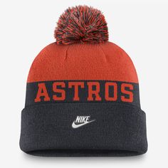 A cold-weather staple, this Rewind Peak Beanie helps keep you warm and comfortable with a classic cuffed design and soft, stretchy acrylic yarns. Its throwback Houston Astros details are paired with a pom and solid-color look for versatility. Sports Beanie For Winter, Winter Sports Beanie Hat, Sporty Beanie For Cold Weather, Sporty Winter Beanie Hat, Navy Hats For Winter Cold Weather, Nike Winter Beanie Hat, Winter Beanie Cap With Ribbed Cuffs, Winter Beanie With Ribbed Cuffs, Black Winter Hat For Fan Gear