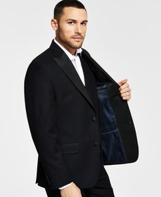 Make sure your style shines at your next sophisticated soiree with the crisp classic lines and shimmering peak lapel of this comfortable stretch suit jacket from Alfani. Black Lapel Collar Outerwear For Semi-formal Occasions, Formal Black Notch Lapel Outerwear, Black Formal Notch Lapel Outerwear, Black Notch Lapel Formal Outerwear, Formal Black Outerwear With Lapel Collar, Black Fitted Tuxedo Outerwear, Fitted Black Tuxedo Outerwear, Black Single Breasted Tuxedo For Fall, Black Tailored Sport Coat With Lapel Collar