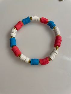 Red, white and blue preppy bracelet makes a perfect accessory to celebrate the 4th of July! Sizes teen, adult Patriotic Blue Bracelets For Beach, Casual Multicolor Bracelets For 4th Of July, Blue Jewelry For 4th Of July Beach Day, Adjustable Bracelets For Beach And 4th Of July, Adjustable Beach Bracelets For 4th Of July, Patriotic Blue Friendship Bracelets, Casual Blue Bracelets For 4th Of July, Patriotic Blue Friendship Bracelet, Blue Patriotic Bracelet For Friendship