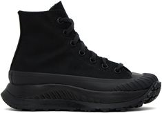 High-top 12 oz canvas sneakers in black. · Rubber cap toe · Lace-up closure · Faux-leather logo patch at inner side · Cushioned CX foam footbed · Canvas lining · Sculptural rubber platform midsole · Rubberized logo patch at heel · Treaded rubber outsole · Platform: H1.5 in Supplier color: Black Black Chuck 70, Black Chucks, Sport Shoes Men, Converse Black, Converse Chuck 70, High Sneakers, Chuck 70, Converse Sneakers, Platform Sneaker