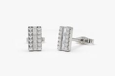 "Diamond Stud Earrings / 14K Gold Baguette Diamond Stud Earrings / Mini Baguette Diamond Studs Sold as a Pair / Dainty Diamond Earrings by Ferkos Fine JEwelry Features ✔Made to Order ✔Gold Kt: 14K (also available in 18K) ✔Available Gold Color: Rose Gold, Yellow Gold, White Gold ✔Length and Width: 6.75 X 3.75MM ✔Baguette Diamonds: 6 pcs 2.25 x 1.25 ✔ Round Diamonds: 24 pcs 1.00MM ✔Number of Diamonds: 30 ✔Total CTW: 0.30ctw ✔ Diamond Color-Clarity: G Color VS Clarity If you have any additional que Dainty Diamond Earrings, Mini Baguette, Gold Armband, Mini Studs, Baguette Diamonds, Diamond Bar, Ruby Jewelry, Diamond Stud Earrings, Emerald Jewelry