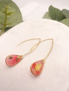 Polymer clay and resin earrings. Super lightweight, stylish and durable. Made with hypoallergenic alloy, stainless steel, brass, gold filled or gold plated components. Please inquire for specifics.  pink delight collection - inspired by rose turkish delight Handmade Statement Dangle Earrings with pink and red alcohol ink and gold details. Finished with glossy resin for light catching shine.  Each piece is completely handmade so no two are exactly the same, each piece is truly unique!    A beauti Trendy Gold Earrings As A Gift For Her, Modern 14k Gold Filled Linear Earrings Gift, Trendy Gold Threader Earrings For Everyday, Modern Dangle Threader Earrings As Gift, Trendy Handmade Adjustable Teardrop Earrings, Adjustable Gold Teardrop Earrings, Adjustable Gold Teardrop Earrings With Ear Wire, Hypoallergenic 14k Gold Filled Threader Earrings, Handmade Dangle Threader Earrings As Gift