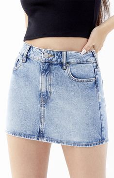 Head into festival season with the super flattering Light Blue Stretch Mid Rise Denim Mini Skirt from PacSun. This mid-rise skirt has a stretchy denim fabrication with a 5-pocket body and a flattering fit. 


	12.25" center front length
	Stretch fabric
	Mid-rise
	5-pocket body
	Zip fly closure
	99% sustainably sourced cotton, 1% spandex
	Medium-impact wash using less water and safer chemicals
	Model is wearing a size 26
	Model measurements: 5’8.5” height, 32” bust, 23.5” waist, 35” hips


Learn more about PacSun eco items Blue Skirt Outfits, Fit Checks, Denim Skort, Zach Bryan, Skirt Trends, Indigo Denim, Family Photo Outfits, Photo Outfit, High Rise Denim