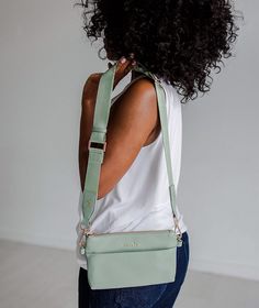 *Limited Edition Color* The Skye sling bag is our much-anticipated crossbody that holds everything you need while you're on the go! It has a built-in wallet with three card slots, two open pockets for extra cards or gum, and a cash slot to stash your bills. On the front, you'll find a zippered pocket where you can store receipts, spare change, or other small items, and a pocket with a magnetic snap closure on the back perfect for keeping your phone safe & sound. Snap on the adjustable nylon stra Everyday Shoulder Bag Strap With Cell Phone Pocket, Everyday Crossbody Bag Strap With Removable Pouch, Versatile Travel Bag Strap With Removable Pouch, On-the-go Pouch Shoulder Bag With Card Slots, Versatile Bag Strap With Removable Pouch For Travel, Versatile Pouch Shoulder Bag With Card Slots, Versatile Travel Bag With Card Slots, Functional Everyday Bag With Card Slots, Modern Shoulder Bag With Card Slots For Everyday