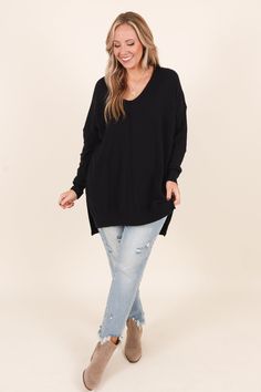 In this top, you'll never miss last year's wardrobe! This sweater has a chic black color you can dress up or down and style with everything in your closet! It's comfortable for all day wear, has a figure-flattering fit, and can be layered with your favorite outerwear! Simply, style this sweater with skinnies and boots for an effortlessly chic look! 50% Viscose, 30% Polyamide, 20% Polyester Black Oversized Chic Knit Top, Oversized Black Chic Knit Top, Versatile Black Sweater For Loungewear, Oversized Black Soft Knit Top, Casual Black Knit Top For Fall, Black V-neck Knit Top For Fall, Chic Black Sweater With Relaxed Fit, Oversized Black Knit Top For Fall, Black V-neck Sweater For Loungewear