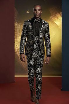 This luxury black and gold tuxedo is perfect for a gala, red carpet or any exclusive black tie event. A perfect statement piece to add to your tuxedo collection for men or women. FREE SHIPPING ON ORDERS OVER $199 COLOR Black/Gold COMPOSITION N/A YARN COUNT N/A WEIGHT 290g FABRIC STYLE Jacquard OCCASION Wedding/Gala Black And Gold Tuxedo, Gold Tuxedo, Black Tie Event, Suit Style, Cuffed Pants, Double Breasted Suit, Straight Pants, Black Tie, Black And Gold