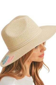 This Straw Beach Bum Panama Hat is crafted from straw, with an internal drawstring and 3'' brim for a custom fit. Featuring bright pastel colored sequin lettering and a faux leather tailored hat band, the Straw Beach Bum Panama Hat provides an eye-catching look while offering reliable sun protection. Cream Brimmed Fedora For Vacation, Cream Fedora For Vacation, Cream Fedora Straw Hat For Vacation, Casual Beige Panama Hat For Beach Season, Trendy Beige Straw Hat, Trendy Beige Wide Brim Straw Hat, Adjustable Cream Straw Hat For Vacation, Cream Short Brim Panama Hat For Beach Season, Summer Travel Straw Hat In Cream Color