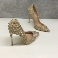 Super Sassy Baby Stud Gold Style Heels 35-42 Eu Must Have !!! Comment 10 Cm Or 12 Cm Height Two Height Available ! Luxury Gold Court Shoes With 4-inch Heel, Chic Gold Embellished Heels, Chic Embellished Gold Heels, Luxury Embellished Pointed Toe Heels, Luxury Spiked Heels For Party, Elegant Spiked Heels For Party, Elegant Fitted Heels With Spikes, Luxury Champagne Heels With Rhinestones, Glamorous Party Heels With Spikes