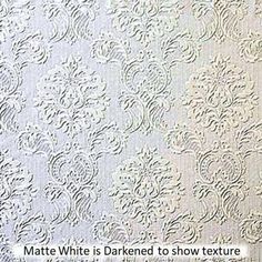 an image of a white wallpaper with intricate designs on the side and bottom half