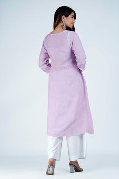 The very beautiful hand embroidered Linen-cotton tunic or kurta, available on demand (made to order) and customizable.Sizing: Please refer to our Size Chart to find your sizeThe item features55% Linen 45% CottonRound neck with wide V slitLong tunic for culottes, leggings or pants3/4 sleevesAverage length: 45 inLength of product may slightly vary as per the sizes. Please note: smaller size may be slightly shorter and bigger size may be slightly longer in lengthVarious colors availableMachine washable (Use mesh, Delicate cycle, Hang Dry)Delivery time: 4-6 weeksFor customization, please email us at info@ayurvastram.com Hand Embroidered Tunics, Tunic Kurti, Light Mauve, Cotton Tunic, Embroidered Linen, Embroidered Tunic, Long Tunic, Beautiful Hand, Hand Embroidered