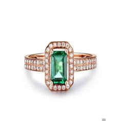 A perfect handmade Bestselling 1.50 Carat Emerald and Diamond Halo Engagement Ring in 14k Rose Gold affordable emerald and diamond engagement ring. The beautiful women's engagement ring is a perfect designer gemstone ring, handmade and customized to perfection. The glittering and shinning perfect emerald gemstone ring is sure to please her at very first sight.ABOUT THIS RING:-Gold Metal: 14K Rose GoldCenter Gemstone:-Beautiful Emerald cut green emerald. The emerald is approx 7x5mm in size.Side S Emerald And Diamond Engagement Ring, Pave Setting Ring, Affordable Rings, Moissanite Engagement Ring Halo, Green Emerald Ring, Emerald Ring Gold, Engagement Rings Affordable, Emerald Diamond Ring, Diamond Halo Engagement Ring