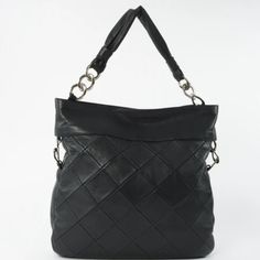 Large Black Leather Tote With Embossed Chanel Logo. Exterior Leather And Hardware In Excellent Condition. No Damage To Leather, Seams Or Hardware. Internal Lining Has Slight Damage On Internal Pocket Seam. Chanel Embossed Bag, Chanel Logo, Black Leather Tote, Black Quilt, Chanel Bags, Chanel Black, Shopping Tote, Quilted Leather, Embossed Logo