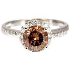 1.78 Carat Natural Fancy Vivid Orange Brown Diamond Ring 18 Karat | From a unique collection of vintage Solitaire Rings at https://www.1stdibs.com/jewelry/rings/solitaire-rings/. Orange Diamond Ring With Prong Setting, Brown Diamond Ring Fine Jewelry, Classic Brown Diamond Jewelry, Luxury Brown Jewelry With Brilliant Cut, Brown Diamond Ring With Diamond Accents For Anniversary, Brown Diamond Ring With Accents For Anniversary, Anniversary Brown Diamond Ring With Accents, Elegant Brown Diamond Ring, Brown Round Diamond Ring In Fine Jewelry Style