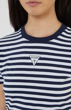 A subtle logo adorns the front of this striped baby tee made of stretchy cotton. Crewneck Short sleeves 95% cotton, 5% elastane Hand wash, dry flat Imported Striped Crew Neck Top With Logo Print, Blue Tops With Signature Stripes For Summer, Cotton Tops With Signature Stripes, Fitted Cotton Tops With Signature Stripes, Blue Short Sleeve Tops With Signature Stripes, Blue Short Sleeve Top With Signature Stripes, Blue Cotton Top With Contrast Stripes, Baby Tee, Infant Tees