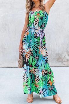 Vacation Maxi Dress With Tie Waist, Vacation Tie-waist Maxi Dress, Bohemian Sleeveless Beach Dress With Tropical Print, Multicolor Sleeveless Dress For Beach Vacation, Black Halter Maxi Dress For Summer, Bohemian Sleeveless Maxi Dress With Tropical Print, Black Halter Dress For Summer Beach, Summer Multicolor Maxi Dress With Tie Straps, Black Halter Dress For Beach Season