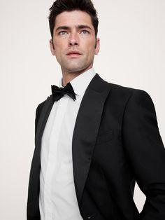 This timeless tuxedo shirt has a cutaway collar and traditional French cuffs with linked buttons so you can replace with cuff links if you like.  Slim fit.  Cutaway collar.  Long sleeves with French cuffs.  Concealed button placket.  Shirttail hem.  Slim fit.  Long sleeves.  Hip length.  Model: Size M, 6'2" (188cm). Formal Tuxedo Dress Shirt With Long Sleeves, Classic Long Sleeve Suits For Black Tie Event, Classic Black Tie Suits With Long Sleeves, Classic Tuxedo With Lapel Collar For Black Tie, Classic Black Tie Tuxedo With Lapel Collar, Classic Semi-formal Tuxedo With Hidden Button Closure, Classic Semi-formal Tuxedo With Hidden Buttons, Classic Formal Tuxedo With Hidden Button Closure, Classic Long Sleeve Blazer For Black Tie Event