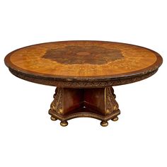 an ornately decorated table with wooden top