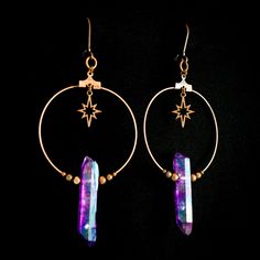 These iridescent purple quartz crystal earrings are the perfect celestial gift idea. Each antique copper hoop earring has a genuine stone hanging beneath an art deco starburst charm and surrounded by dainty copper beads. These earrings are a bold conversation starter. They are a bit heavy due to the fact that these are real quartz crystals, but the ultra light hoop and charms help offset the weight. A gorgeous oddity jewelry set. -Genuine iridescent purple quartz crystals -Art deco starburst cha Iridescent Round Jewelry With Ear Wire, Celestial-style Pierced Rose Gold Jewelry, Celestial Style Pierced Rose Gold Jewelry, Adjustable Star-shaped Magical Jewelry, Celestial Rose Gold Pierced Jewelry, Handmade Iridescent Metal Jewelry, Celestial Iridescent Earrings For Gift, Iridescent Pierced Drop Earrings, Bohemian Iridescent Jewelry For Jewelry Making