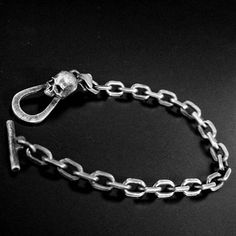 ✪Product details: ◆Material: 925 silver ◆Size: ring: about 20mm long*14mm wide                  Chain thick 6mm                  Length 18mm*Width 9mm*Thickness 12mm or so               ◆Weight: Approximately 30 g of silver (Since jewelry is handmade, size and weight will vary slightly) ◆About design: This is a simple, simple and versatile skull 25 sterling silver bracelet. Linked pictures show novelty photo style vintage antique finish also available in polished finish. Every piece of jewelry has its own scenery, and there is always a scenery that belongs to you. Please leave me a message for your selection. All my jewelry is hand carved and crafted by my masters. As these items are in high demand and are handcrafted, we will allow 7 business days for production. 📦Every delivery is safe Minimalist Formal Jewelry With Oxidized Finish, Minimalist Oxidized Jewelry For Formal Events, Minimalist Oxidized Jewelry For Formal Occasions, Symbolic Metal Jewelry For Formal Occasions, Formal Sterling Silver Bracelets With Box Clasp, Antique Silver Sterling Silver Bracelets For Formal Occasions, Antique Silver Bracelet With Oxidized Finish For Formal Occasions, Classic Antique Silver Bracelets For Formal Occasions, Classic Antique Silver Bracelet For Formal Occasions