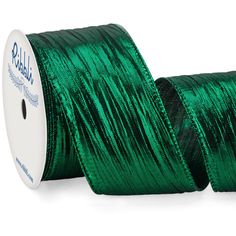 a spool of green metallic ribbon on a white background