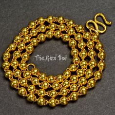 Thank you for coming in! Gorgeous 24K solid yellow gold necklace with old-fashioned plain balls and S hook clasp! One Spectacular necklace with exotic charm! Inside it has a '999' stamp mean gold content 99.9% AKA 24k solid gold. 19 inch length! You'll get the necklace you see! SIZE: 3.5mm diameter Weight: Appr. 14 grams MATERIAL: 24k Solid Yellow Gold Luxury Gold Beaded Necklaces With Beaded Chain, Luxury Gold Beaded Necklace With Polished Beads, Gold Beaded Necklace For Formal Occasions, Luxury Gold Necklaces With Polished Beads, Luxury Gold Beaded Chain Necklace, Gold Single Strand Round Bead Necklaces, Gold Single Strand Round Bead Necklace, Classic Handmade Yellow Gold Necklace, Gold Single Strand Beaded Necklace