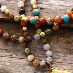 Mala Necklace I am Earth With this Mala Necklace, I feel the power of nature on me, I feel free to express myself, I value myself, I am worthy... In this Colorful handmade beaded Necklace, we love its rich and sunny shades. In this Mala, we blended a mix of 108 beads in different sorts of jasper stones. Set your intention and let the universe guide you along your journey. This mala necklace can be worn as a necklace or used as support in your meditation practices. Orange range stones and crystal Spiritual Necklace, Geometric Pendant Necklace, Agate Pendant Necklace, Long Beaded Necklace, Beaded Pendant Necklace, 7 Chakras, Neck Chain, Mala Necklace, Charm Pendant Necklace