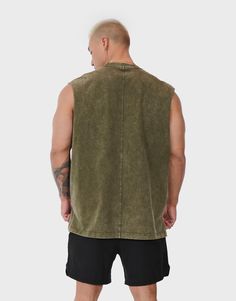 Enjoy the unique blend of style and functionality with the Elevate Men's Tank Top. This oversized men's tank, designed with a sleek crewneck, exudes a distinct look, thanks to its striking acid-washed fabric. Crafted entirely from 100% premium cotton, it promises a gentle touch on the skin while ensuring breathability. The tank's wide cut further facilitates ease of movement, making it an ideal choice for active days or relaxed outings. Model: Kyle is 5'11 tall, chest size 44" and wears size XL. Distressed Crew Neck Muscle Tee For Streetwear, Acid Wash Crew Neck Muscle Tee For Summer, Casual Washed Crew Neck Muscle Tee, Casual Washed Muscle Tee With Crew Neck, Acid Wash Sleeveless Top For Streetwear, Urban Acid Washed Tops, Casual Acid Wash Cotton Muscle Tee, Casual Washed Black Crew Neck Tank Top, Acid Wash Cotton Sleeveless Muscle Tee