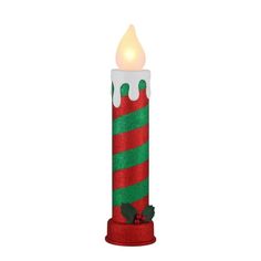 a red and green christmas candle with a white light on the top that is lit up